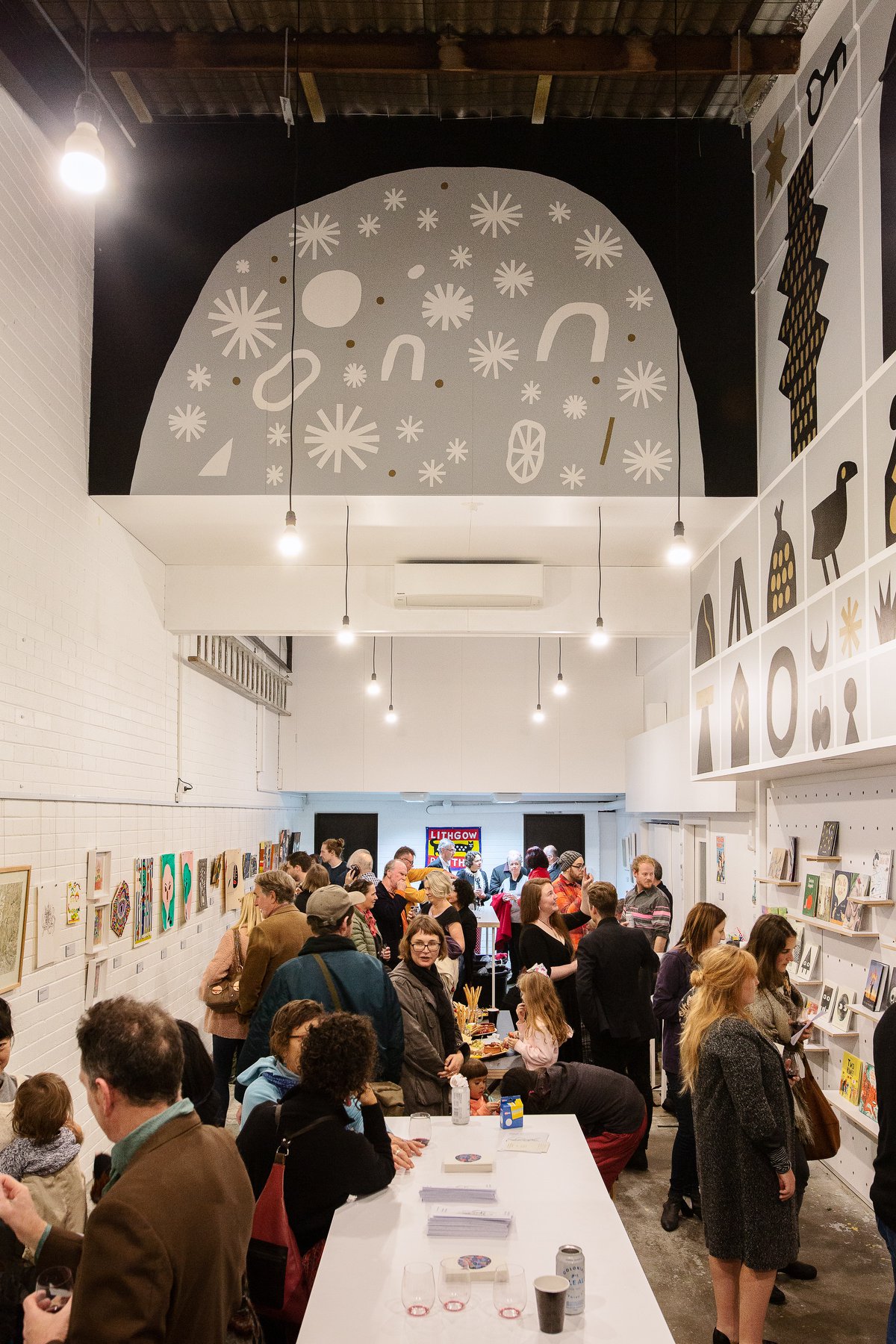 A photo of a mural for The All Story.